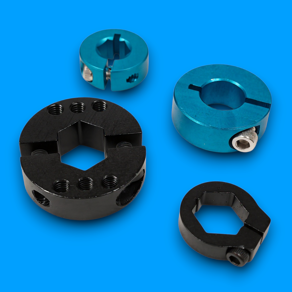 SWYFT Robotics aluminum shaft collars in black and blue, featuring hex clamping hubs for FRC robotics axles.